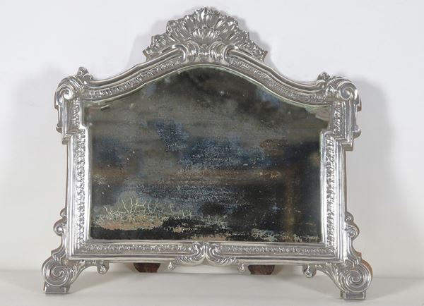 Ancient chiselled and embossed silver card with Louis XV motifs, slightly defective mercury mirror and wooden support