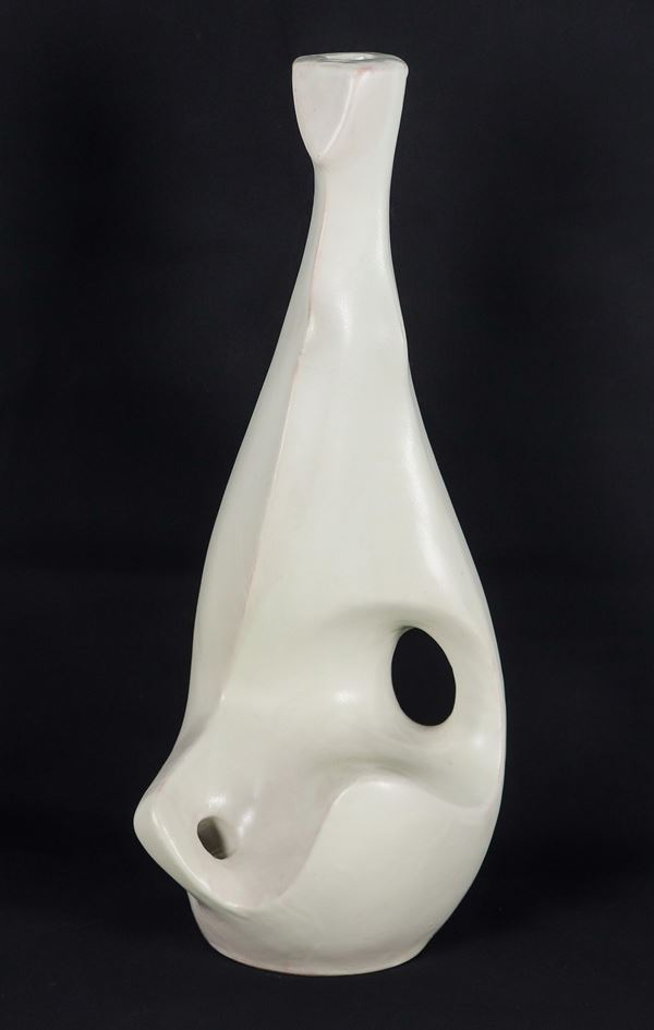 Abstract sculpture in white glazed ceramic, predisposed for electric light