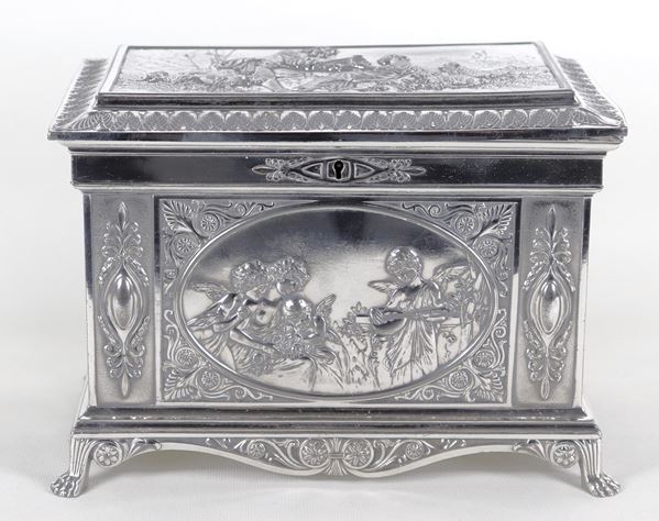 Antique German jewelery chest, marked WMF, in silvered metal and embossed with Empire motifs with bucolic scenes, allegories of cherubs and female portraits. Key missing