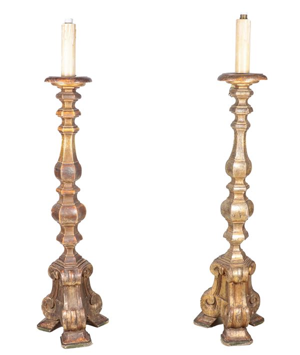 Pair of large antique Louis XIV floor torch holders in silvered, gilded and carved wood, reduced to electric light