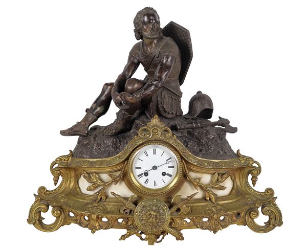 Antique French bronze and marble table clock with warrior sculpture, white enamel dial with Roman numerals. Second half of the 19th century. Not working, to be serviced