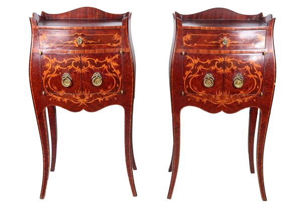 Pair of central Ligurian bedside tables with a rounded shape in walnut and purple ebony, with volute inlays of flowers and leaves, a central drawer, two small doors underneath and four curved legs