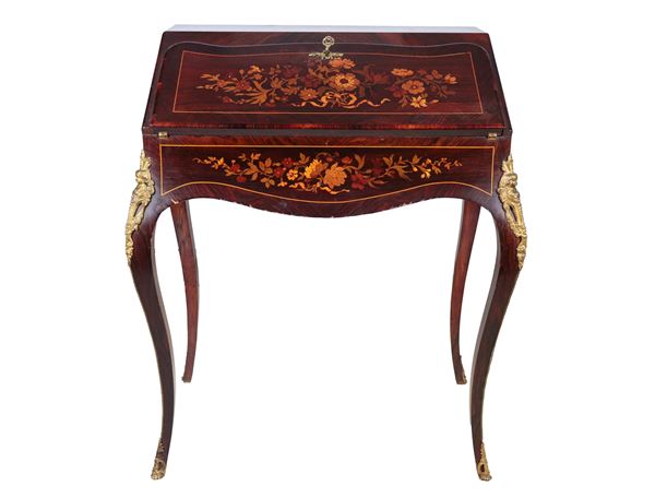 Antique small French Napoleon III flap (1852-1870) in walnut and purple ebony, entirely inlaid with various precious woods with floral garland motifs, slide forming a desk with three drawers inside and sliding top, four high curved legs with bronze fittings gilded and chiselled