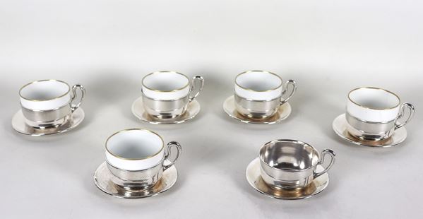 Lot of five white Limoges porcelain cups with six silver supports, one cup is missing and one has cracks, gr. 420