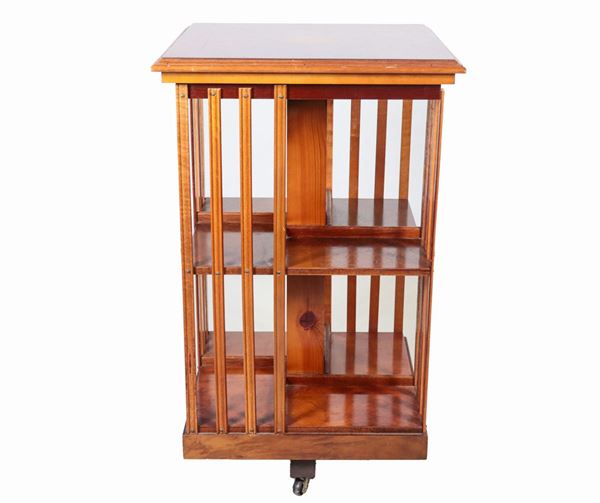 English square-shaped revolving bookcase in thuja briar with inlaid top with central rosette, various compartments