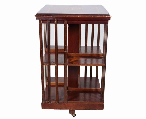 English square-shaped revolving bookcase in walnut root, with top inlaid with geometric threads and central rosette, various compartments. Minor defects