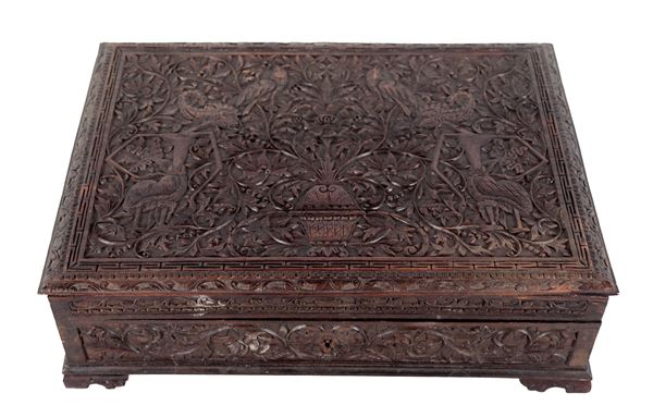 Rectangular wooden box entirely carved in relief with floral scrolls, vases and birds, two compartments inside