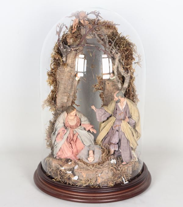 "Nativity", Neapolitan nativity scene puppets in terracotta and wood with blown glass bell and round walnut base