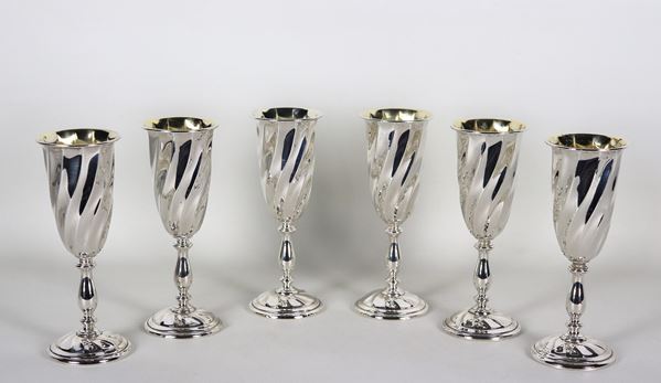 Lot of six chiselled and torchon embossed silver flutes, gr. 930