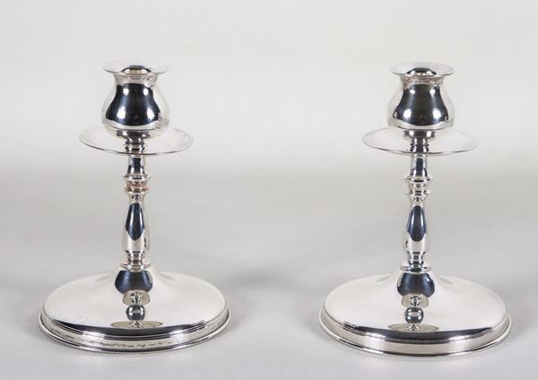 Pair of small smooth silver candlesticks, gr. 190