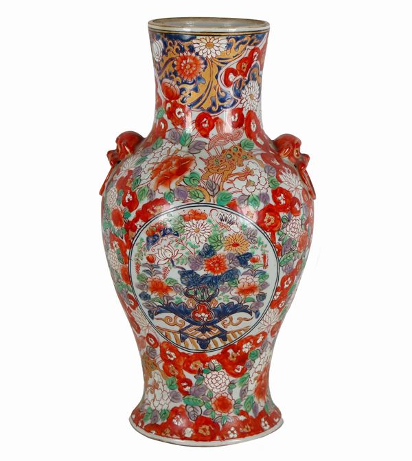 Chinese porcelain vase entirely decorated with polychrome enamels in relief with motifs of flowers, birds and dragons