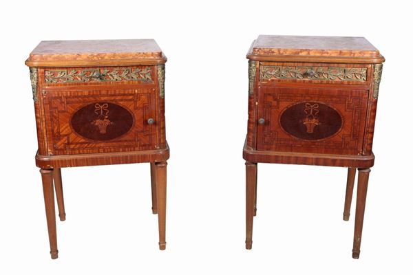 Pair of French bedside tables from the Louis XVI line in bois de rose and purple ebony, with thread and rosette inlays, tops in breccia marble, a drawer and a small door underneath each with ceramic covering inside