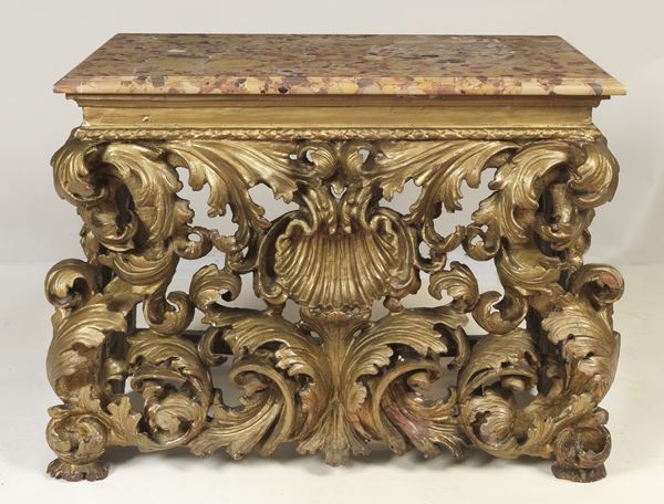 Antique console from the Louis The gilding has defects and false interventions