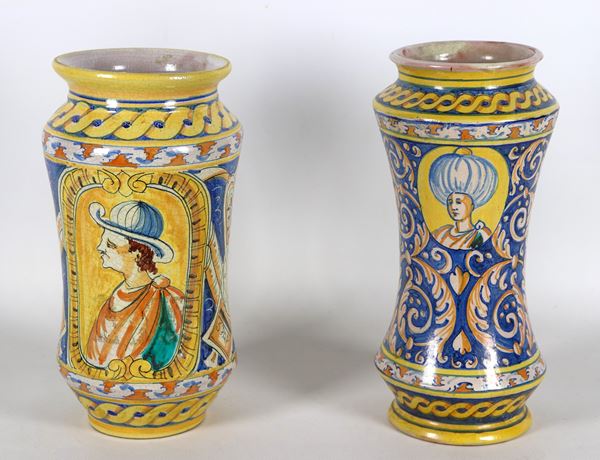 Lot of two Sicilian majolica albarelli with colorful decorations, in the center figures of "Man with turban" and "Man with hat"