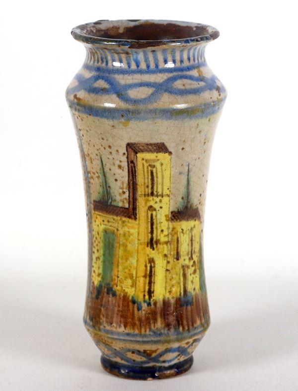 Albarello in Italian majolica with polychrome decoration of a church with bell tower and flowers, defects