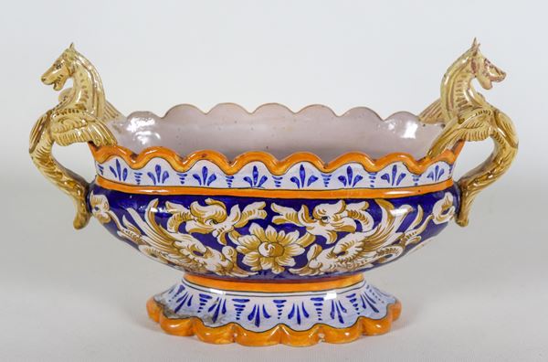 Small oval centerpiece in glazed Umbrian majolica, with dragon-shaped handles