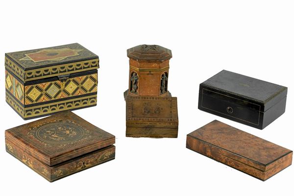 Six boxes in wood and leather