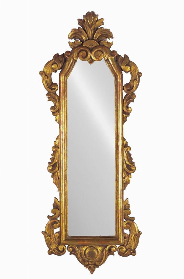 Ancient small mirror in gilded wood and carved with Louis XV motifs, mercury mirror