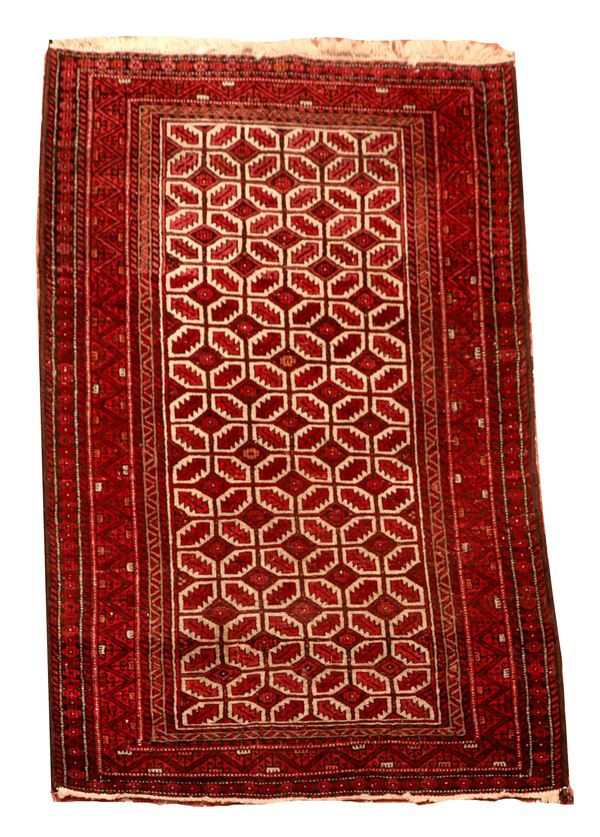 Yomut Persian carpet with geometric designs on a red background, M 1.75