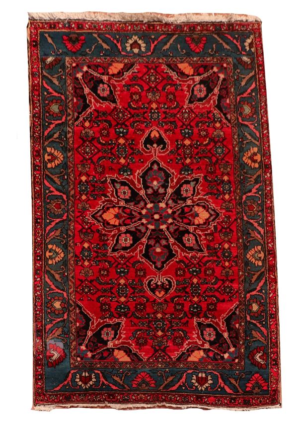 Persian Shirvan carpet with woven floral designs on a red background with blue border, M 2.03 X 1.33