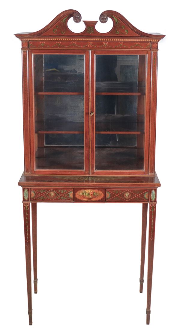 Antique English Sheraton display cabinet in mahogany, with colorful inlays of garland motifs with bows, rosettes and intertwined threads. The upper part has two doors with glass, the internal part in the shape of a small table