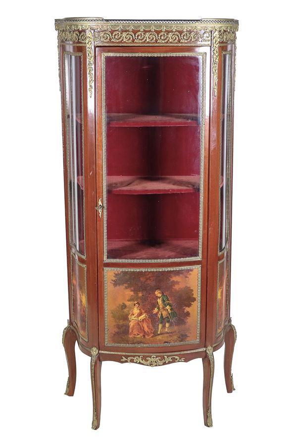 Antique semi-round French display cabinet in mahogany, with gilt bronze friezes and fittings and underlying panels painted with gallant scenes in the manner of "Vernis Martin", a central door, marble top with pierced railing and four curved legs