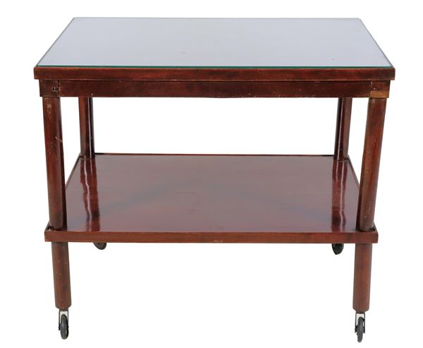 1950s-60s trolley with rectangular shape in mahogany, with four column legs and two shelves