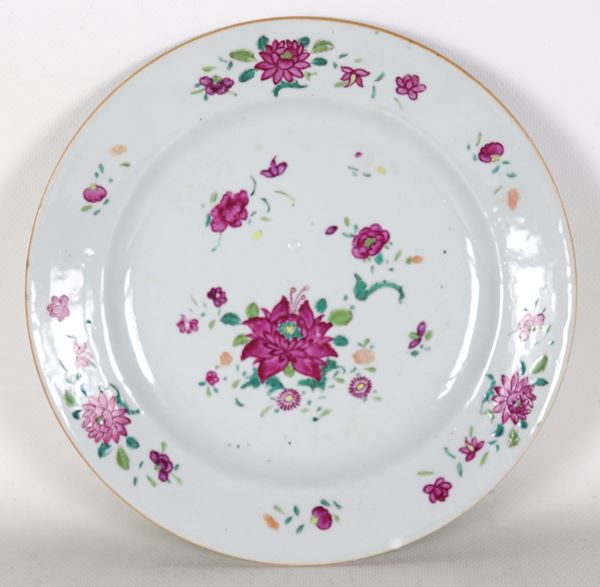 Antique Chinese East India Company wall plate, in porcelain with polychrome enamel decorations in relief of flowers, small chip on the edge