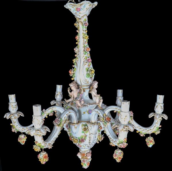 Capodimonte polychrome porcelain chandelier, with cherub statuettes and floral garlands in relief, 6 lights. Minor defects