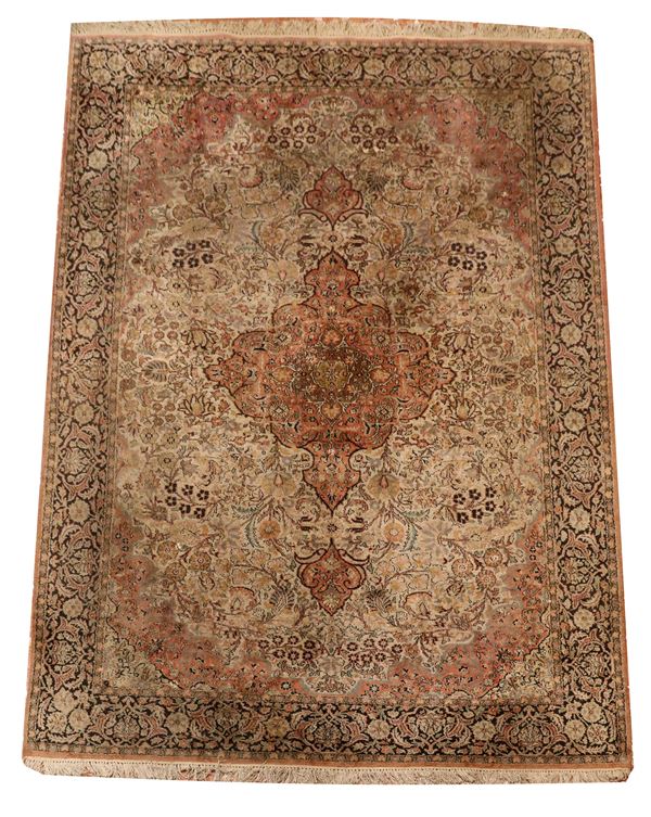 Islamabad Persian carpet with floral design on a havana background and blue border, M 3.31 x 2.21