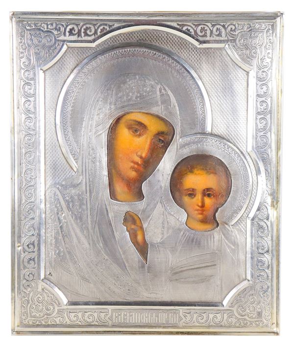 "Mother of God of Iver", icon painted on panel with chiselled and embossed silver lancet. Stamps Moscow 1888