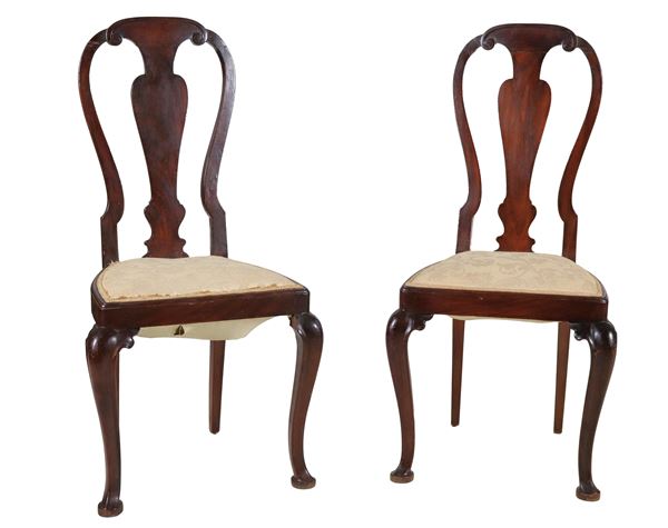 Pair of antique walnut chairs from the Louis XV line, with high cabriolet backs and four curved legs