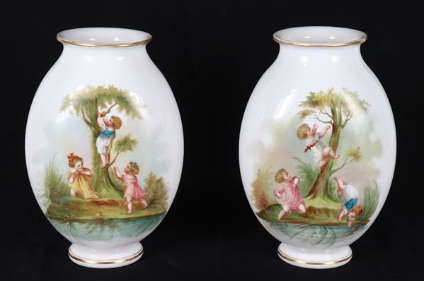 Pair of antique French vases in opaline glass, with colorful decorations of children's games