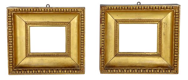 Pair of ancient small Tuscan "cassette" frames from the Empire period, in gilded and carved wood
