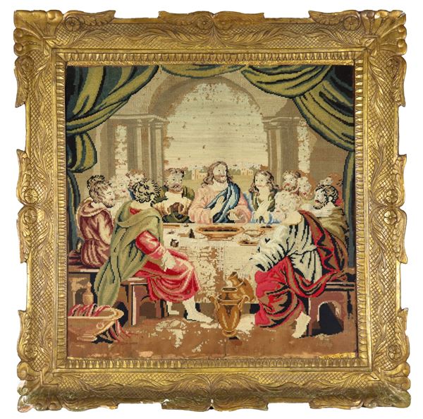 Ancient embroidered fabric "Biblical scene" in an ancient gilded and carved wooden frame. The fabric has various color drops