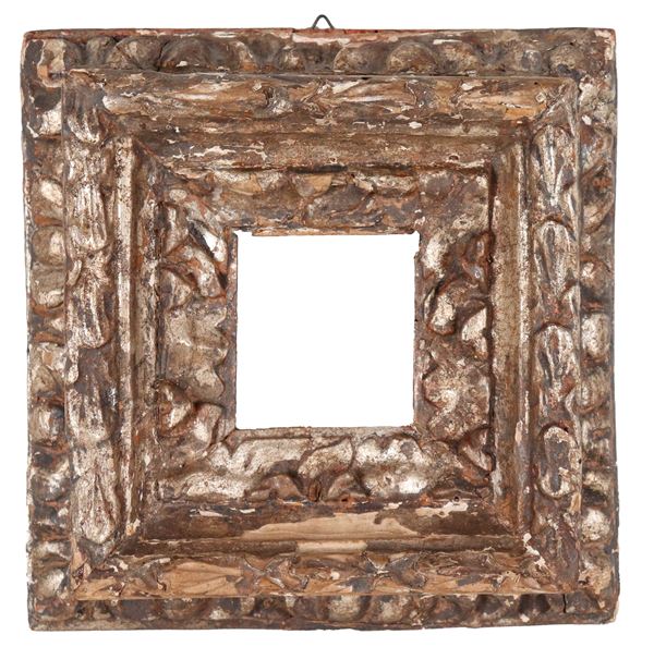 Ancient small wooden frame in Mecca with two orders of carvings