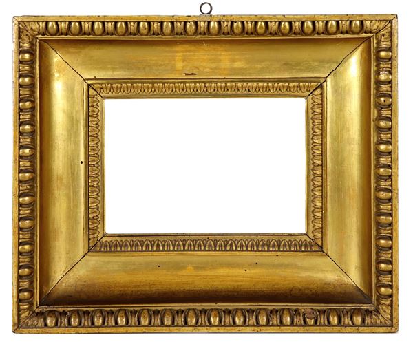 Ancient Tuscan "cassette" frame from the Empire period, in gilded and carved wood