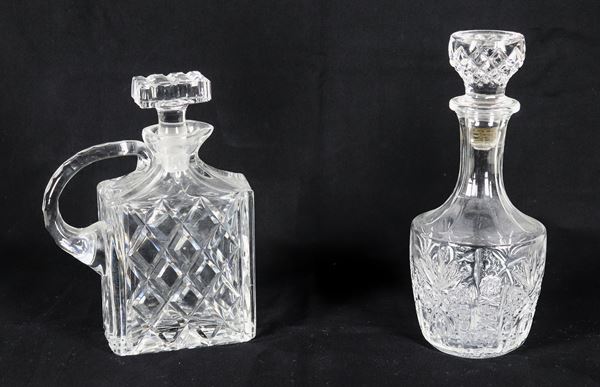 Lot of two diamond-tipped crystal bottles, one rectangular with handle and one round