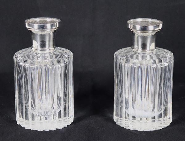 Pair of small round perfume bottles in worked crystal, with 925 silver caps