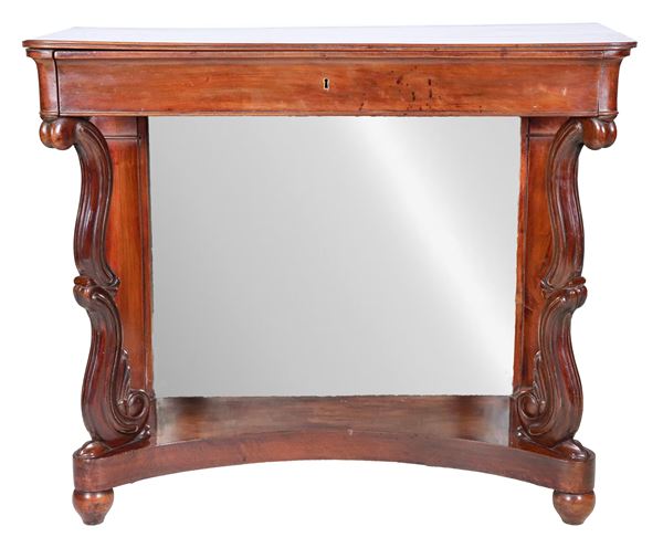 Tuscan Empire console in mahogany, rectangular shape with central drawer, two shaped legs and two rectangular column rear legs joined by a rounded top, surmounted by a mirror