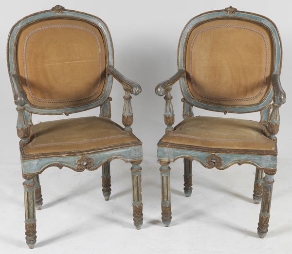 Pair of antique Louis XVI armchairs from the Marche, in lacquered and gilded wood with semi-oval backs and four fluted legs, cover in Havana velvet