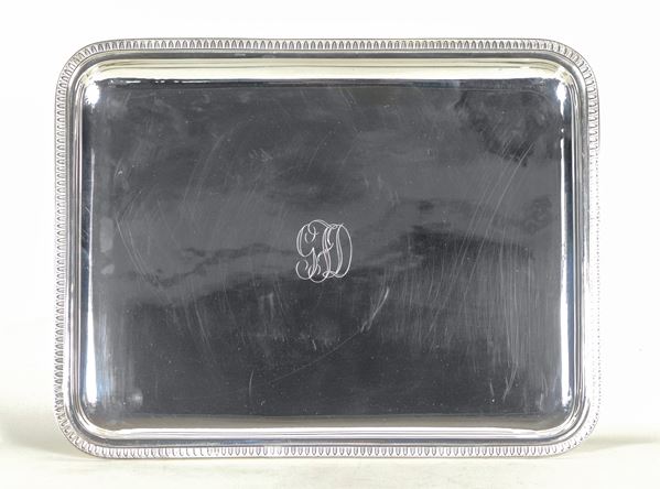 Rectangular silver tray, with chiseled and embossed edge with Empire motif, engraved monogram in the centre, gr. 1015