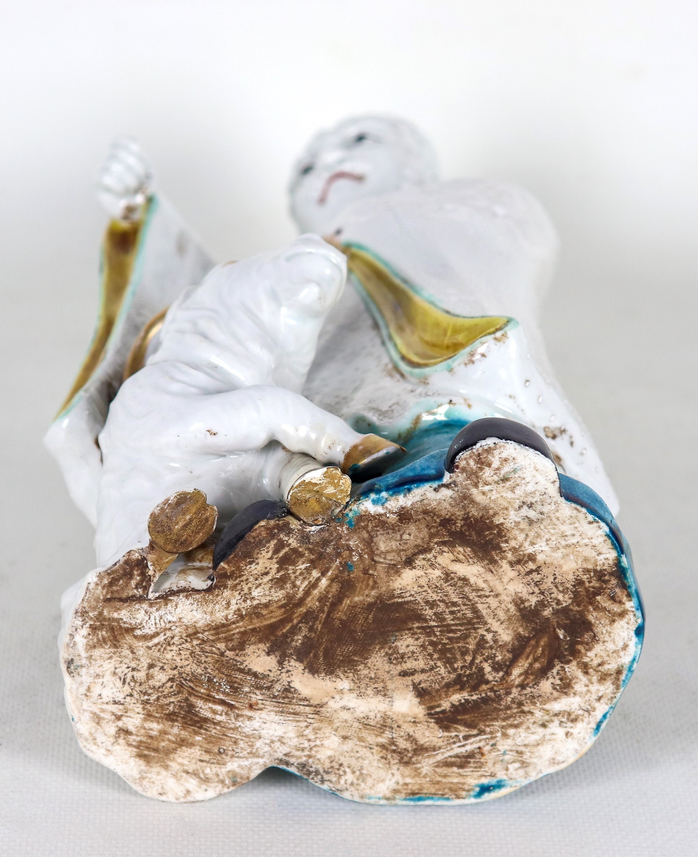 "Santone con caprone", scultura in porcellana policroma smaltata