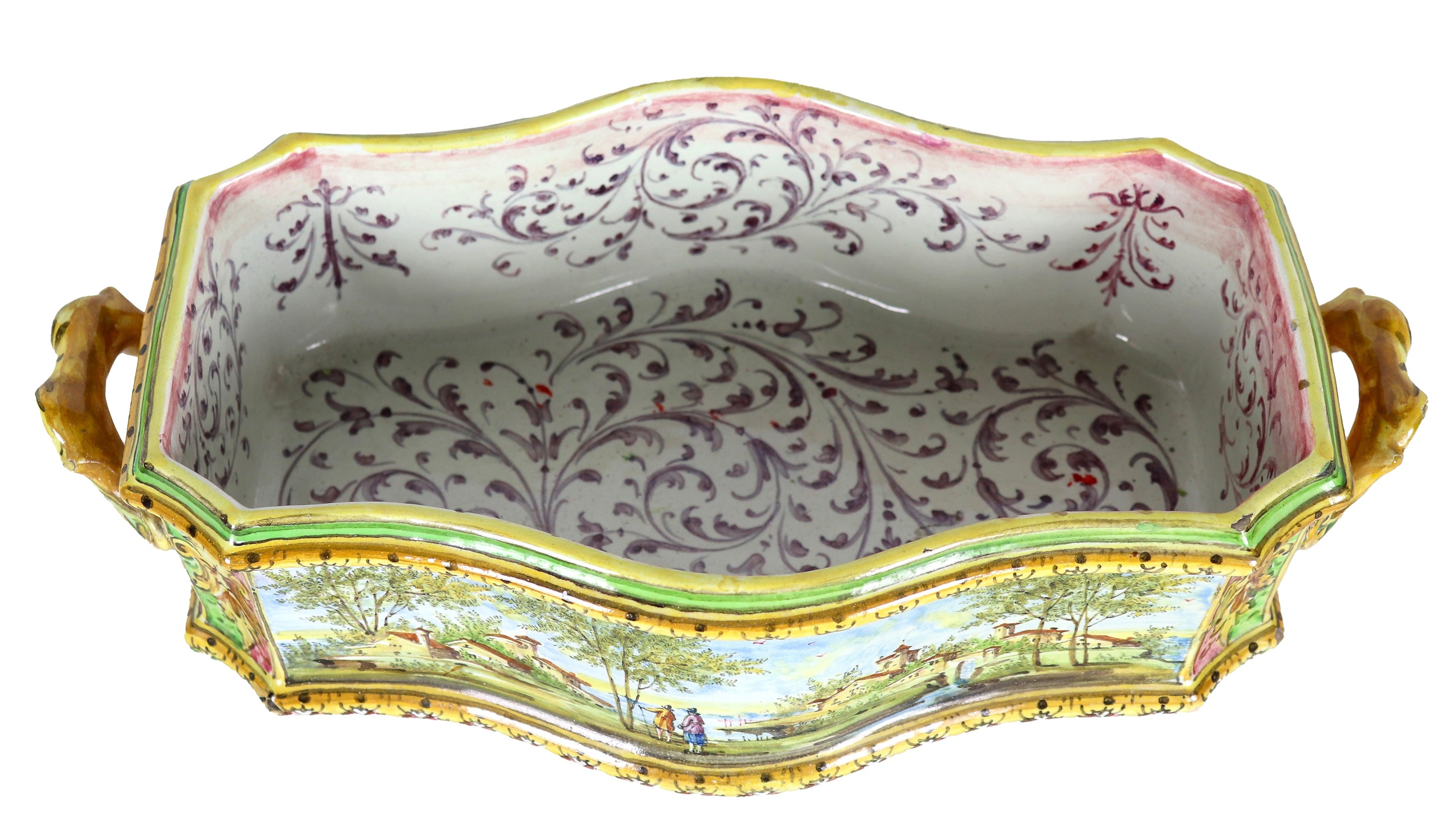 Antico centrotavola in maiolica bolognese policroma, a forma rettangolare centinata con due manic...