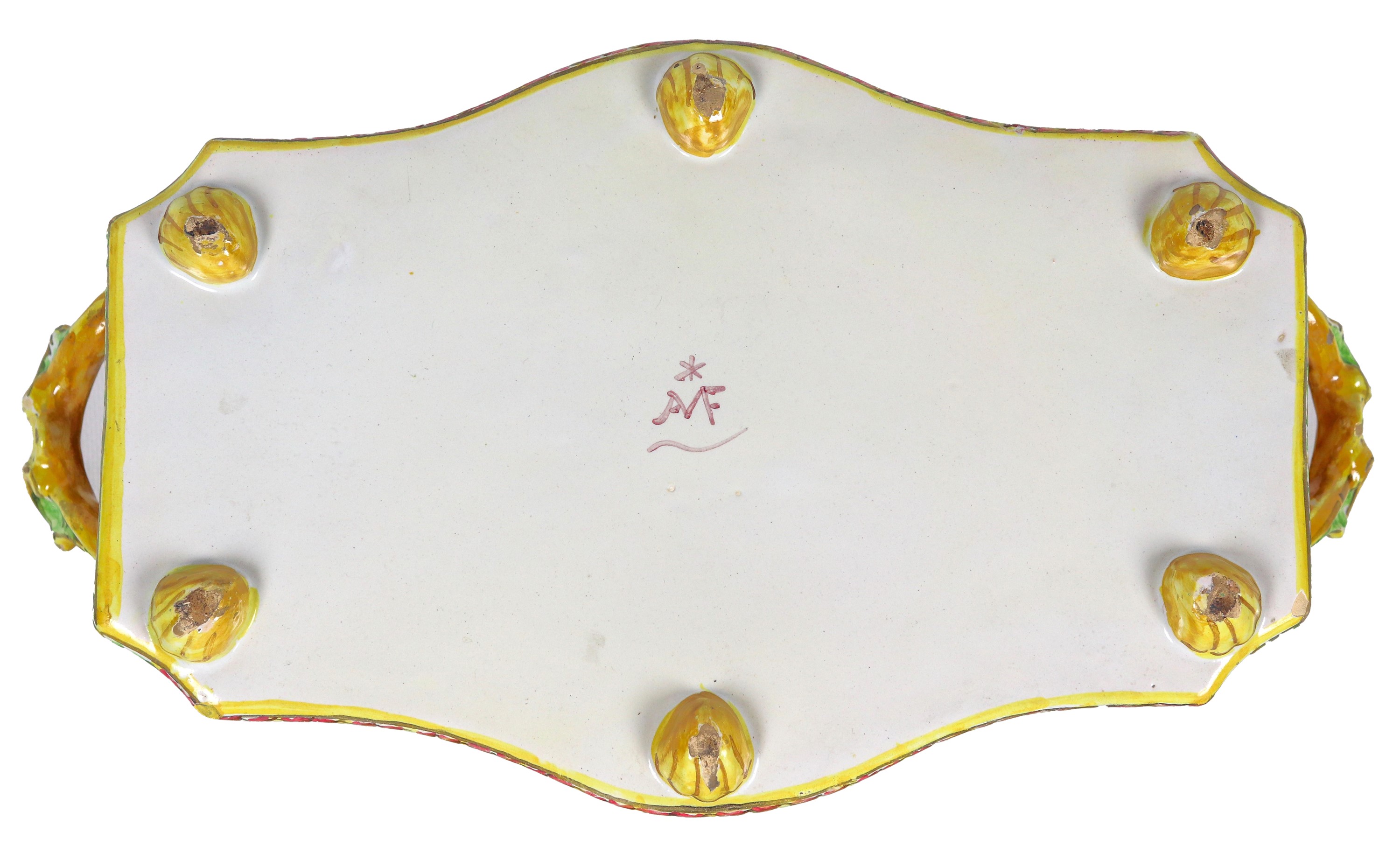 Antico centrotavola in maiolica bolognese policroma, a forma rettangolare centinata con due manic...