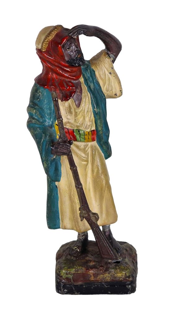 "Berber with rifle", small polychrome metal sculpture, slight defects