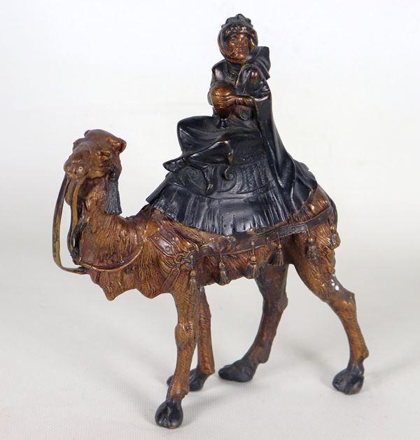 "Wise King with camel", small patinated bronze sculpture