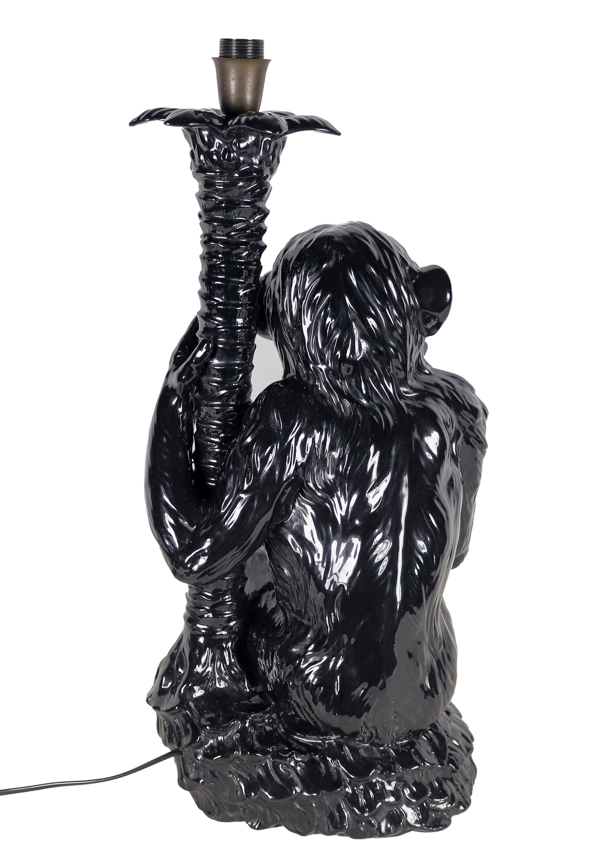 "Scimmia", scultura in ceramica smaltata nera trasformata a lampada. Anni '60-'70