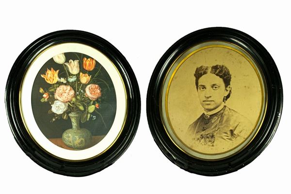 Pair of oval frames in ebonized wood