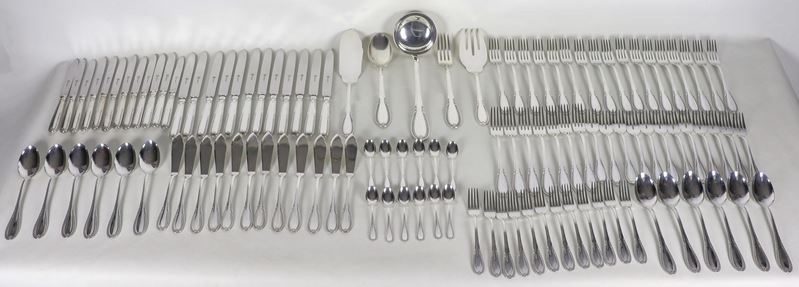 Servizio di posate in argento cesellato e sbalzato a motivi Impero, marcato Schiavon (pz 113), gr...